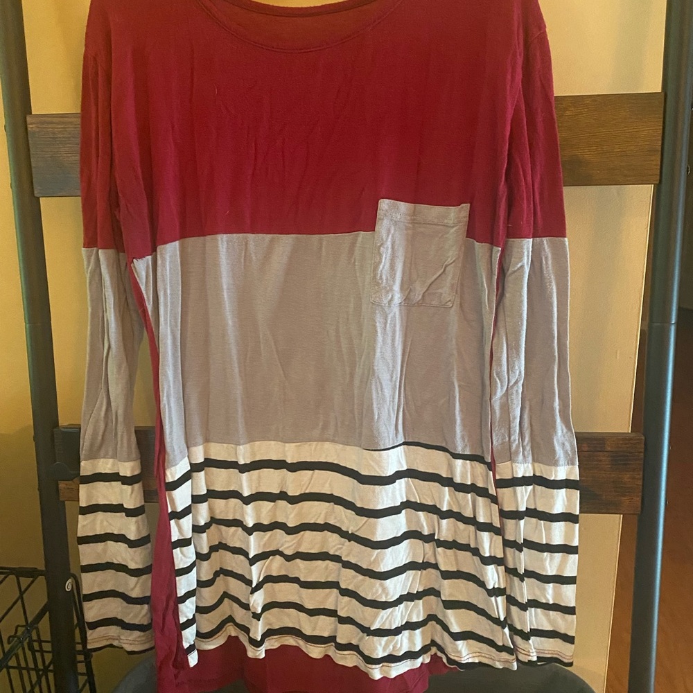 Red, white, and black long sleeve